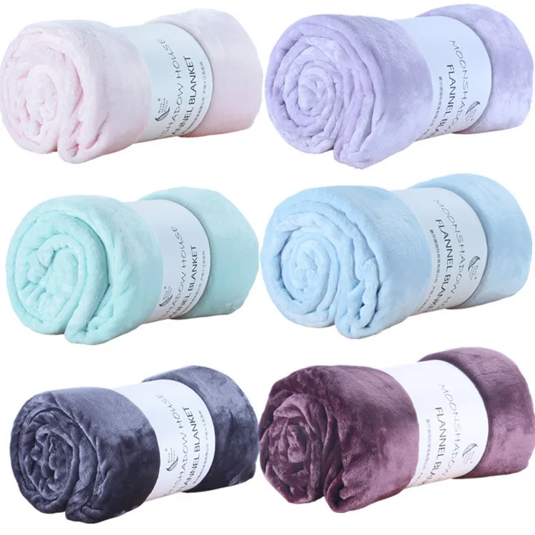 Solid flannel blankets in many colors, rolled display